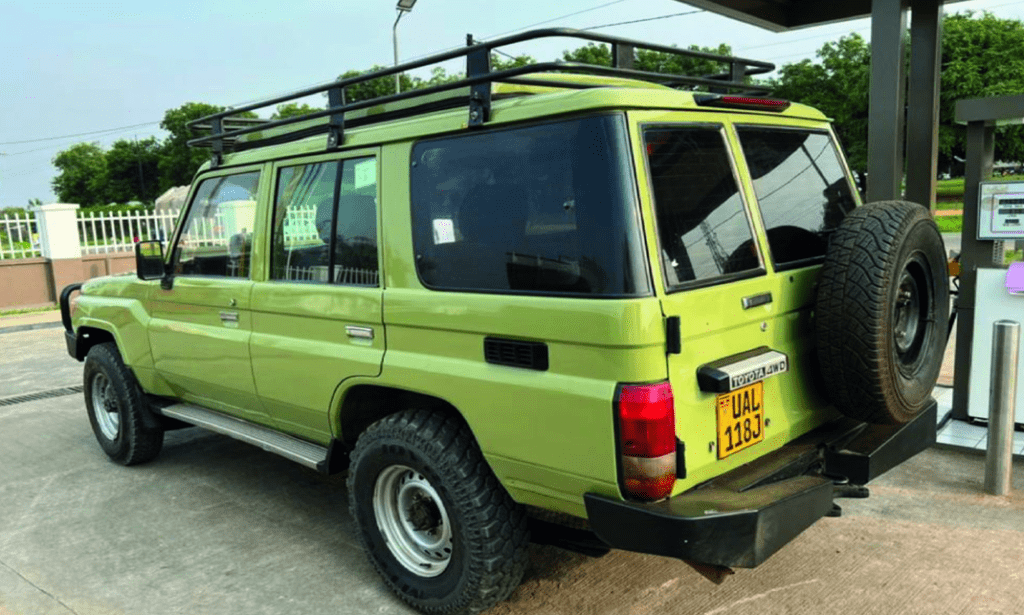 Burundi 4x4 safaris vehicle exploring the scenic Lake Tanganyika shoreline