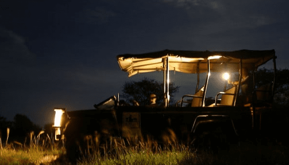 Night Safari in Burundi safari vehicle tracking nocturnal wildlife
