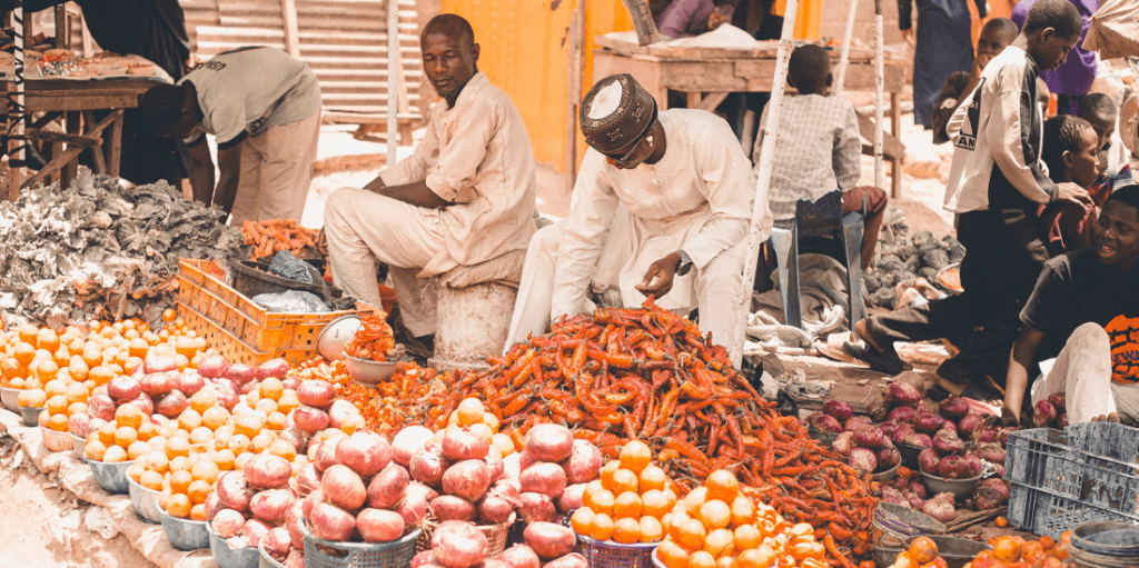 Colorful stalls and busy traders during Burundi Market Tours